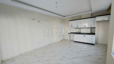 Квартира 1+1 в новом доме района Махмутлар в 400 м от Средиземного моря фото 10