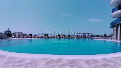 Квартира 1+1 в новом ЖК в районе Махмутлар в 1500 м от моря фото 12