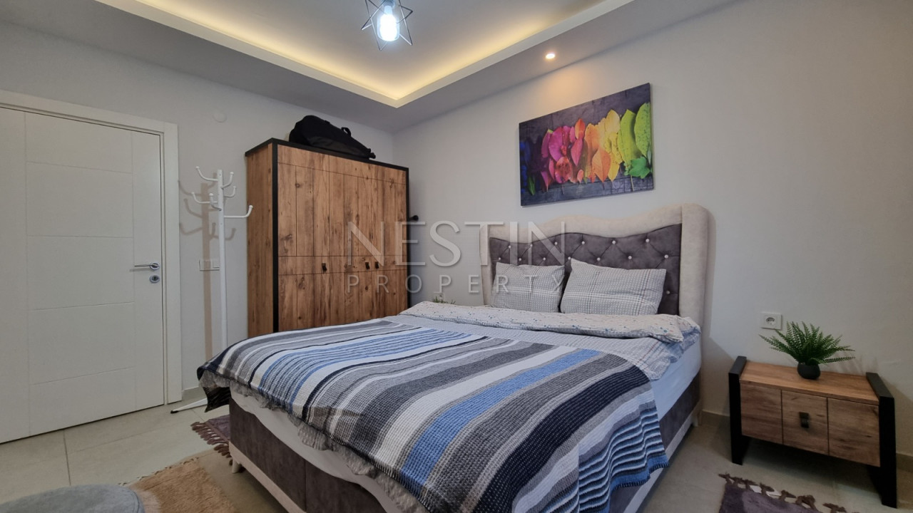 Квартира 1+1 в 400 метрах от моря в районе Каргыджак фото 22