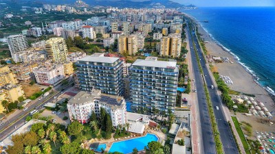 Квартира 2+1 на первой береговой линии в Махмутларе по невероятно низкой цене фото 1