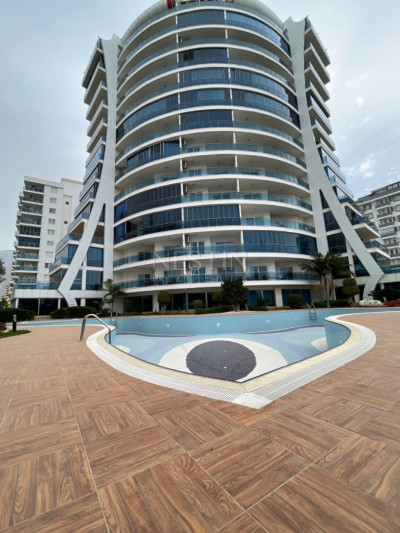 Квартира 1+1 с красивым видом на море в районе Махмутлар фото 1