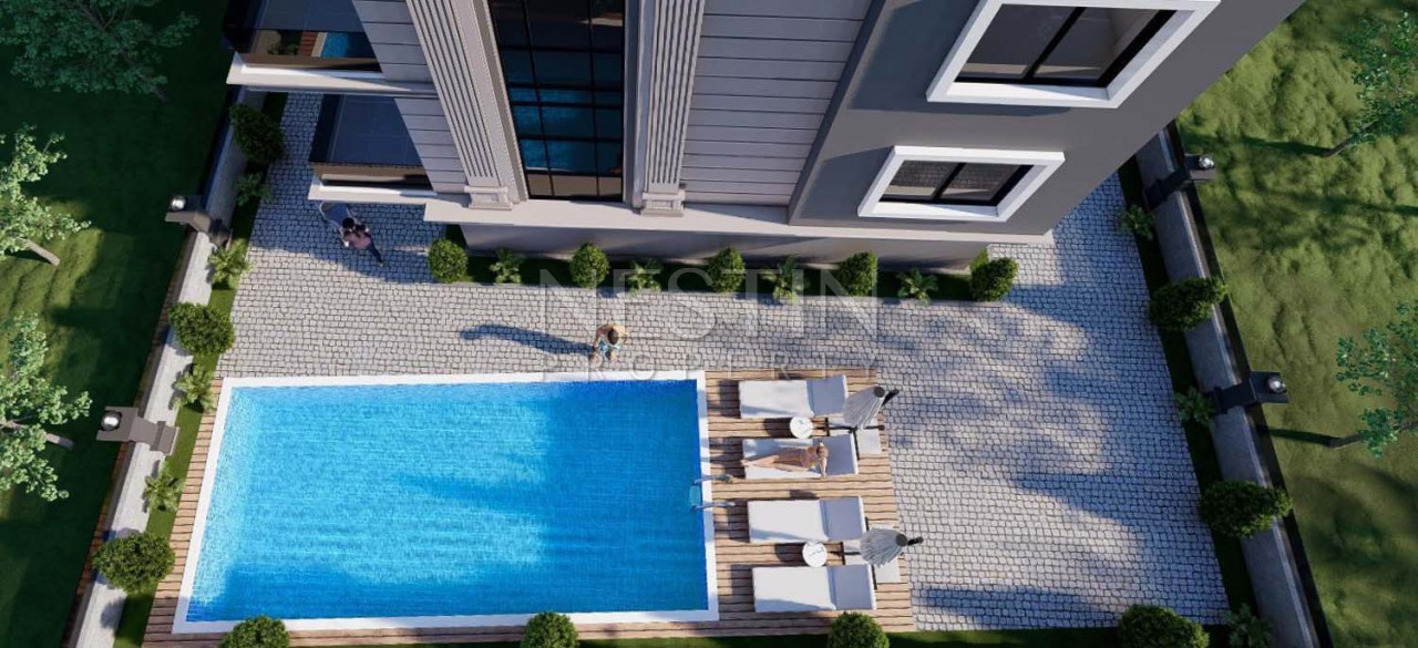 Квартиры 1+1 и 2+1 в новом ЖК на этапе строительства в районе Авсаллар фото 7