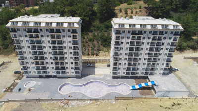 Квартира 1+1 в новом стильном комплексе в районе Авсаллар фото 1