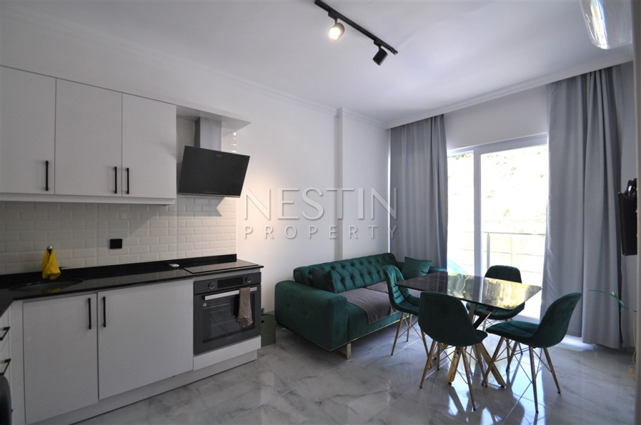 Меблированная квартира 1+1 в новом комплексе в районе Авсаллар фото 6