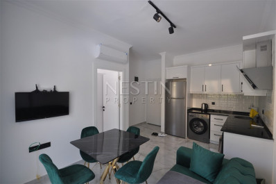 Меблированная квартира 1+1 в новом комплексе в районе Авсаллар фото 8