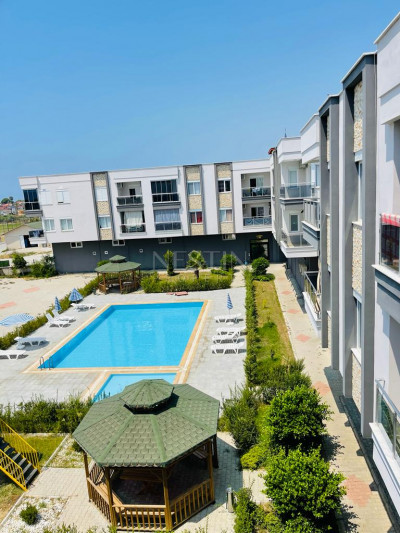 Квартира 1+1 в районе Конаклы в 200 м от Средиземного моря фото 1