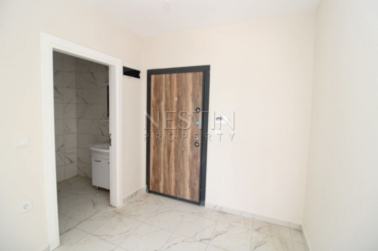 Квартира 1+1 в новом комплексе в 400 метрах от моря в районе Махмутлар фото 5