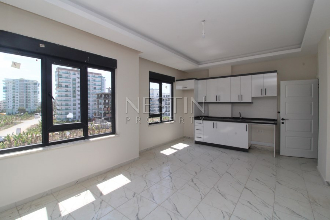 Квартира 1+1 в новом комплексе в 400 метрах от моря в районе Махмутлар фото 8