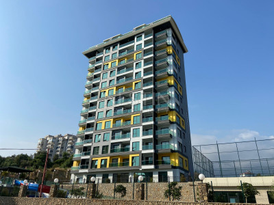 Продажа квартиры 1+1 в комплексе района Махмутлар фото 1