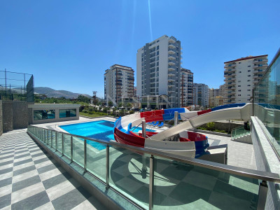 Продажа квартиры 1+1 в комплексе района Махмутлар фото 3