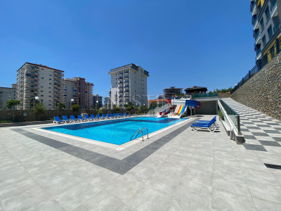 Продажа квартиры 1+1 в комплексе района Махмутлар фото 5