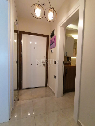 Апартаменты 1+1 в новом комплексе на первой береговой линии в районе Махмутлар фото 9