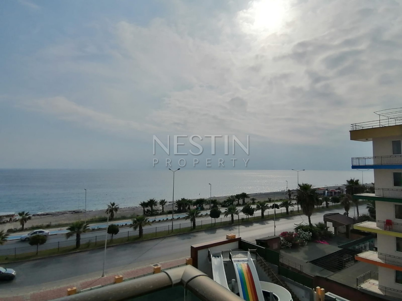 Апартаменты 1+1 в новом комплексе на первой береговой линии в районе Махмутлар фото 10