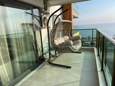 Апартаменты 1+1 в новом комплексе на первой береговой линии в районе Махмутлар фото 11