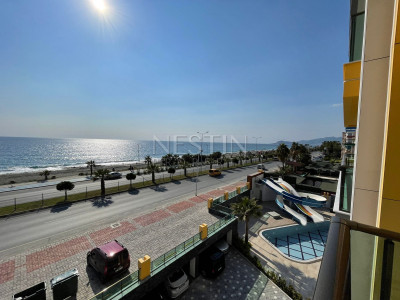 Апартаменты 1+1 в новом комплексе на первой береговой линии в районе Махмутлар фото 21