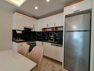 Апартаменты 1+1 в новом комплексе на первой береговой линии в районе Махмутлар фото 24