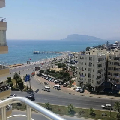 Апартаменты 2+1 в комплексе района Тосмур в 100 метрах от моря фото 1