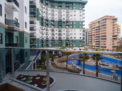 Квартира 1+1 в хорошем комплексе района Махмутлар фото 1