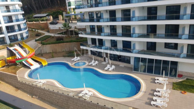 Просторная квартира 1+1 в комплексе района Каргыджак фото 3