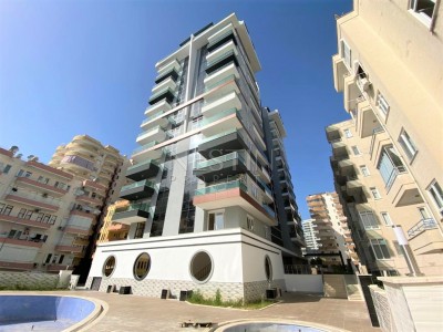 Квартира 2+1 в новом доме с бассейном, восточный Махмутлар фото 1