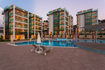 Большие квартиры 2+1 и 3+1 в районе Каргыджак с видом на море фото 1