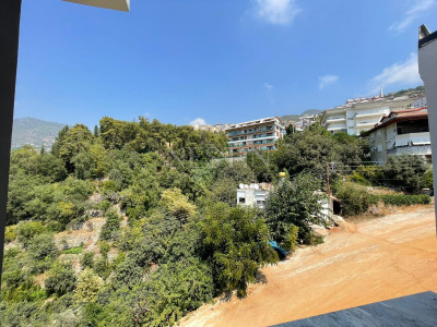 Просторная квартира дуплекс в новом комплексе в центре Алании фото 20