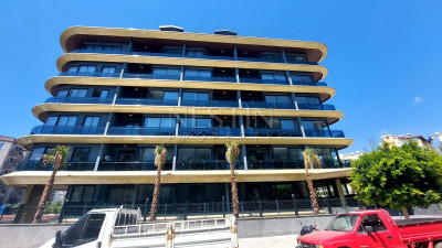 Квартира 1+1 в элитном комплексе в центре города Алании фото 1