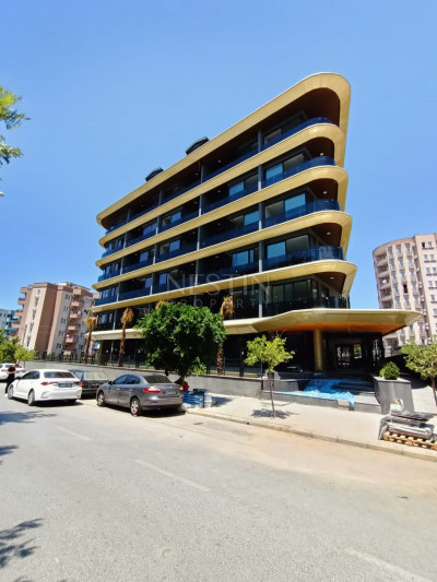 Квартира 1+1 в элитном комплексе в центре города Алании фото 2