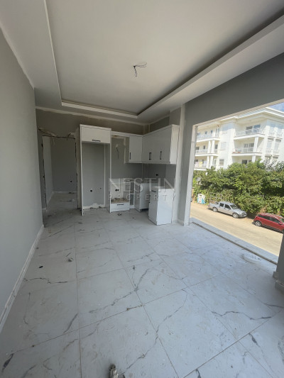 Квартиры 1+1 в районе Оба на этапе завершения строительсвта фото 16