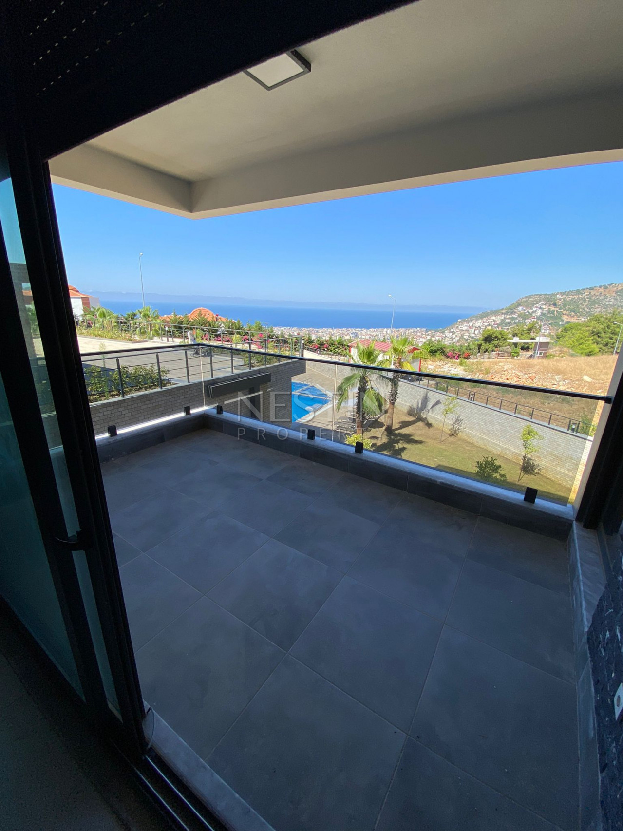 Садовый дуплекс 5+1 в районе Тепе с видом на море фото 21