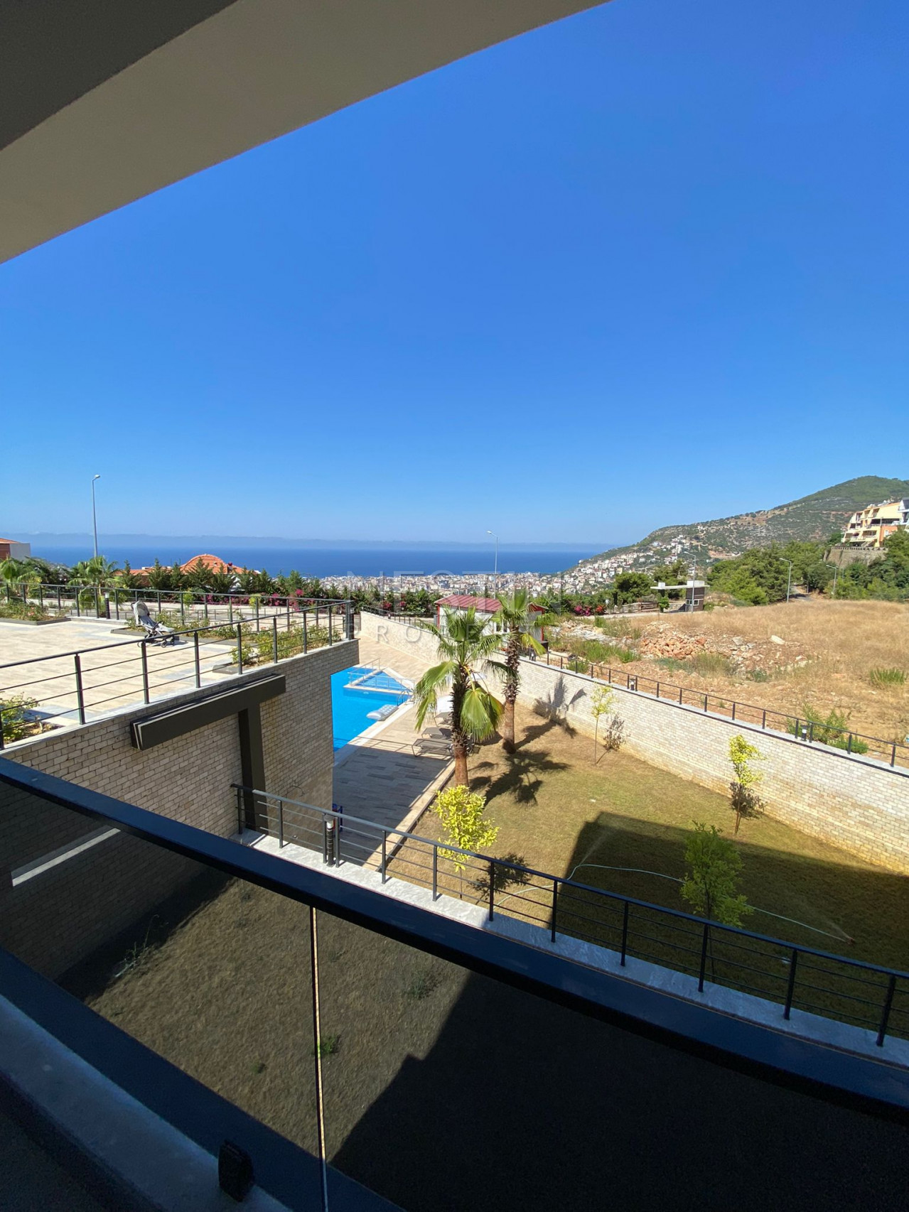 Садовый дуплекс 5+1 в районе Тепе с видом на море фото 20