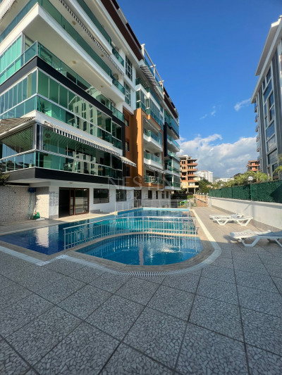 Большая квартира 1+1 в районе Тосмур в 200 м от моря фото 1