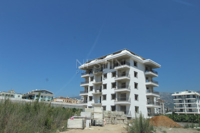 Квартира 1+1 в новом доме в районе Каргыджак в 200 м от моря фото 5