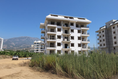 Квартира 1+1 в новом доме в районе Каргыджак в 200 м от моря фото 6