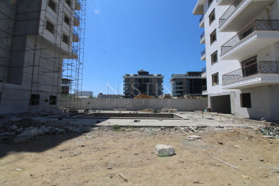 Квартира 1+1 в новом доме в районе Каргыджак в 200 м от моря фото 8