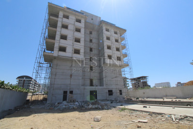 Квартира 1+1 в новом доме в районе Каргыджак в 200 м от моря фото 9