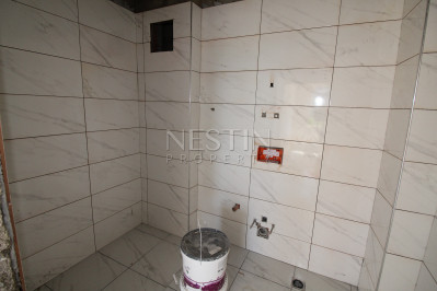 Квартира 1+1 в новом доме в районе Каргыджак в 200 м от моря фото 12