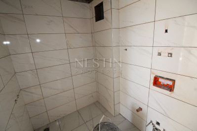 Квартира 1+1 в новом доме в районе Каргыджак в 200 м от моря фото 14