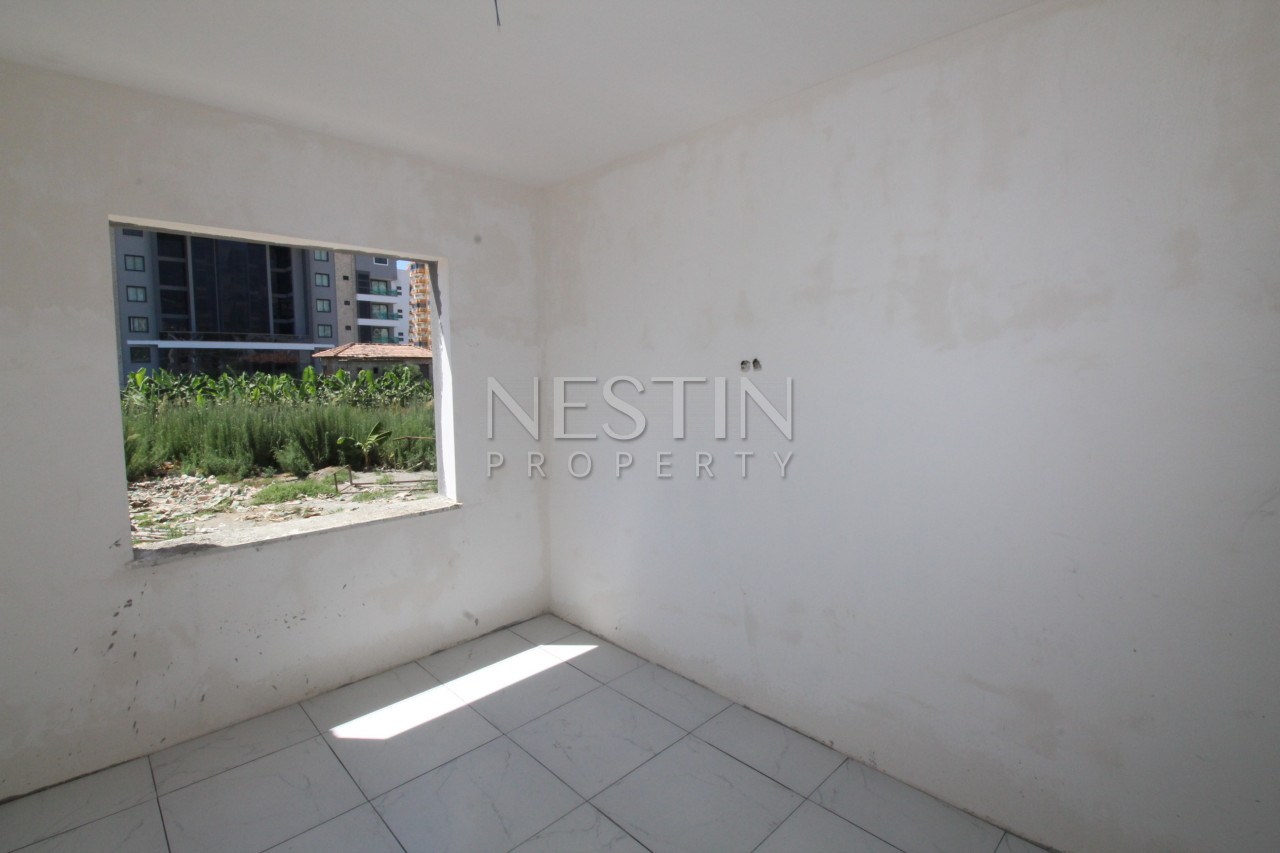 Квартира 1+1 в новом доме в районе Каргыджак в 200 м от моря фото 16