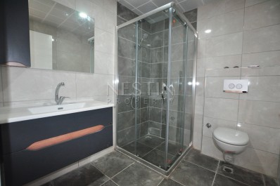 Новая квартира 2+1 в доме городского типа в Махмутларе фото 29