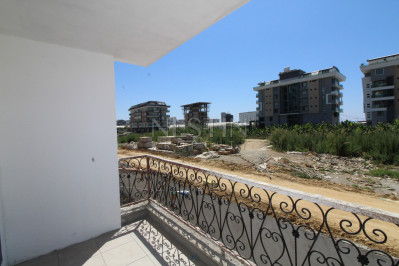 Квартира 1+1 в новом доме в районе Каргыджак в 200 м от моря фото 24