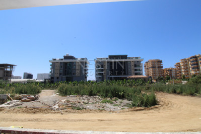 Квартира 1+1 в новом доме в районе Каргыджак в 200 м от моря фото 28