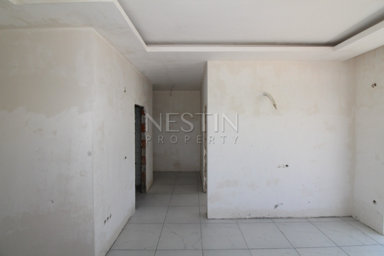 Квартира 1+1 в новом доме в районе Каргыджак в 200 м от моря фото 30