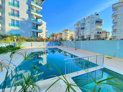 Апартаменты 1+1 в престижном районе Оба, в 400 метрах от Средиземного моря. фото 1