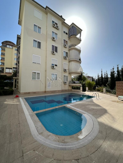 Апартаменты 2+1 в благоустроенном районе Джикджилли, в 850 метрах от Средиземного моря фото 1