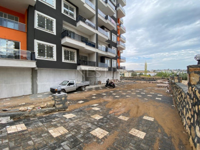 Новая квартира в районе Авсаллар, в 800 м от Средиземного моря. фото 4