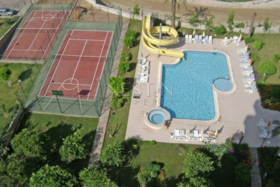 Апартаменты 1+1 в комплексе с инфраструктурой район Джикджилли, в 800 метрах от Средиземного моря фото 2