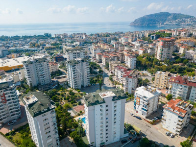 Апартаменты 1+1 в комплексе с инфраструктурой район Джикджилли, в 800 метрах от Средиземного моря фото 3