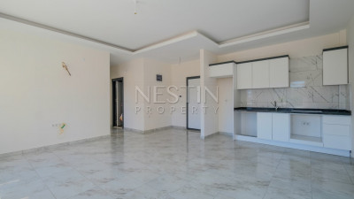 Новые апартаменты 2+1 в популярном районе Махмутлар, в 450 метрах от моря фото 3