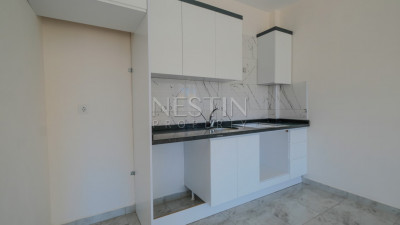 Новые апартаменты 2+1 в популярном районе Махмутлар, в 450 метрах от моря фото 4